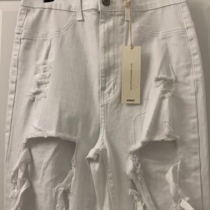 NWT: Fashion Nova Ripped White Jeans